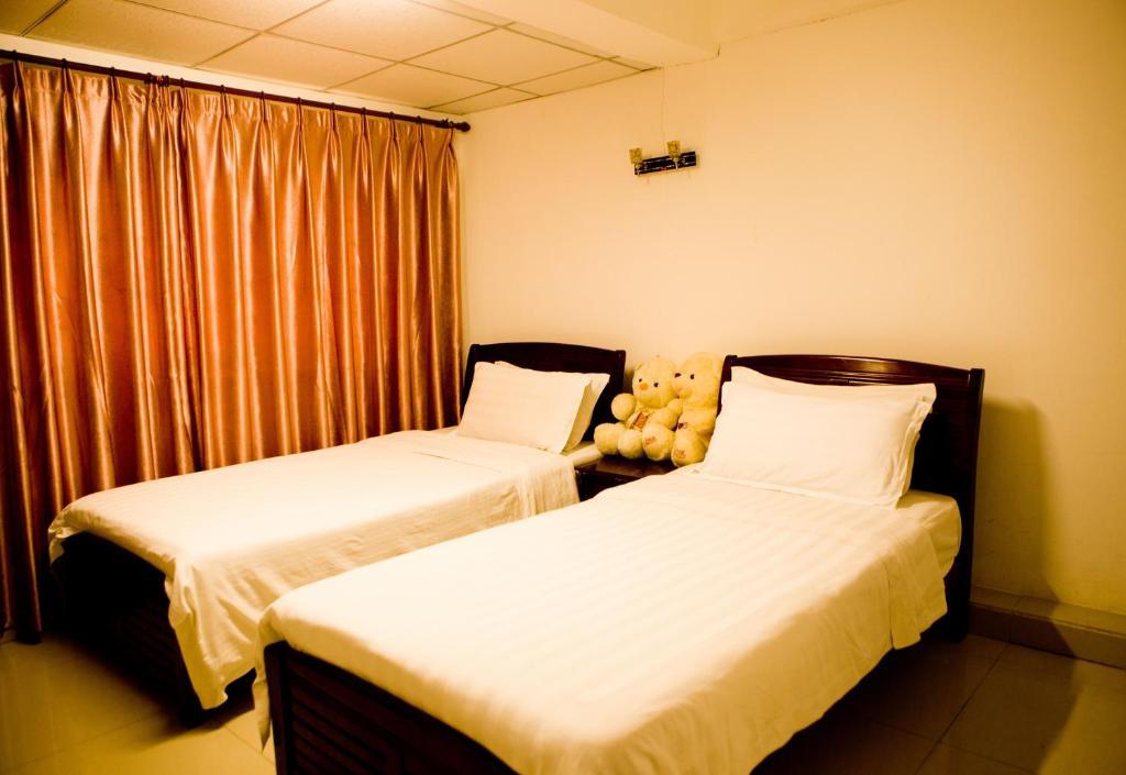 Sanya Hairulan Hotel Quarto foto